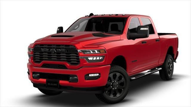 2026 RAM Ram 2500 RAM 2500 BLACK EXPRESS CREW CAB 4X4 6'4' BOX in Molten Red Pearl-Coat Exterior Paint — front three-quarter view